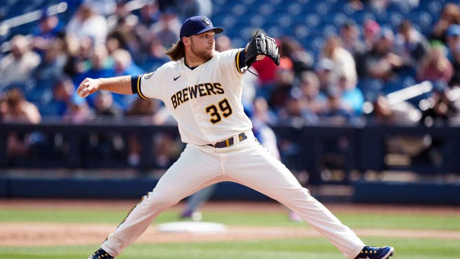 Corbin Burnes delivers a pitch during a spring training game vs. the Texas Rangers at Surprise Stadium in Surprise, Arizona.