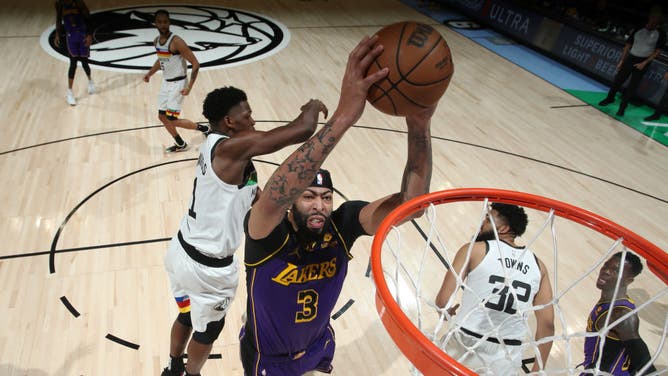 Anthony Davis dunks the ball on the Timberwolves at Target Center in Minneapolis.