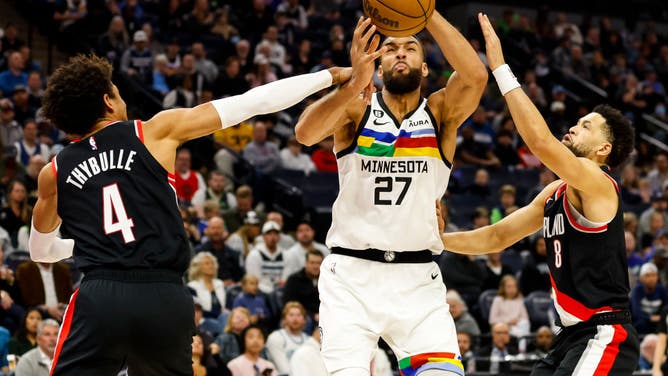 Timberwolves big Rudy Gobert is fouled by Trail Blazers SF Matisse Thybulle at Target Center in Minneapolis.