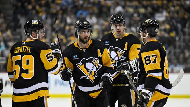 Jake Guentzel, Kris Letang, Evgeni Malkin, and Sidney Crosby of the Pittsburgh Penguins.