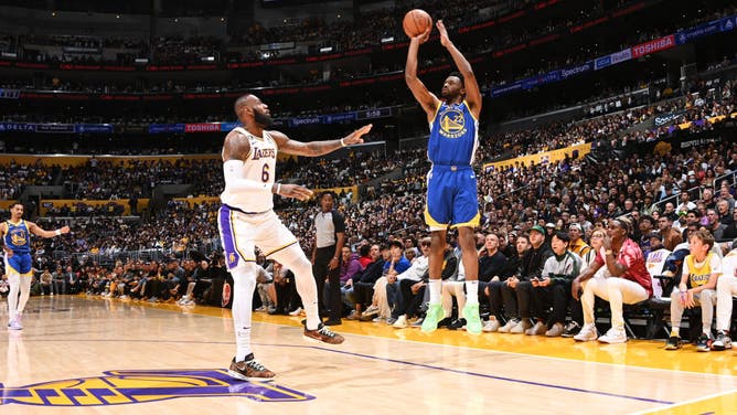 Warriors SF Andrew Wiggins shoots a 3-pointer in Game 3 vs. the LA Lakers at Crypto.Com Arena in Los Angeles.