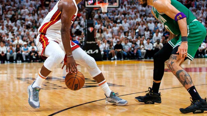 Heat SF Jimmy Butler drives against Boston Celtics SF Jayson Tatum during the 3rd quarter of Game 7 of the NBA Eastern Conference Finals.