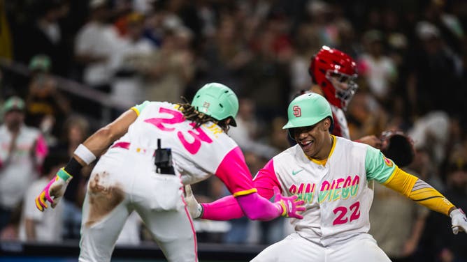 Padres OF Juan Soto with teammate Fernando Tatis Jr. after hitting a home run in the 8th inning vs. the Washington Nationals at Petco Park in San Diego.