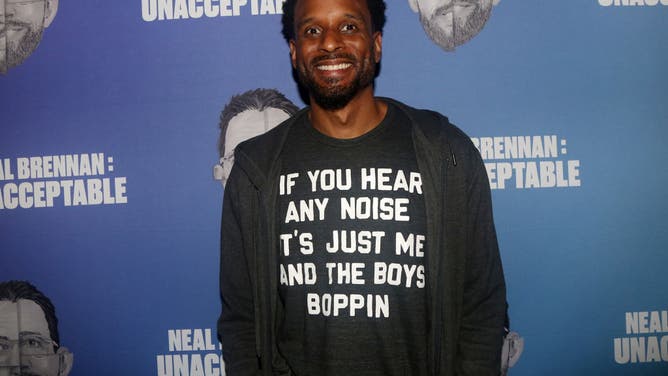 Bomani Jones poses at the opening night arrivals for