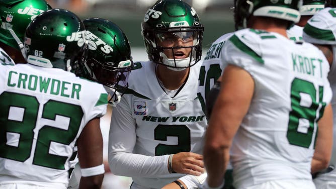 Coin toss predicts Jets season.