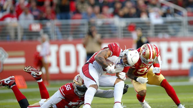 The San Francisco 49ers tackle Arizona Cardinals RB James Conner during the game at Levi's Stadium in Santa Clara, California.