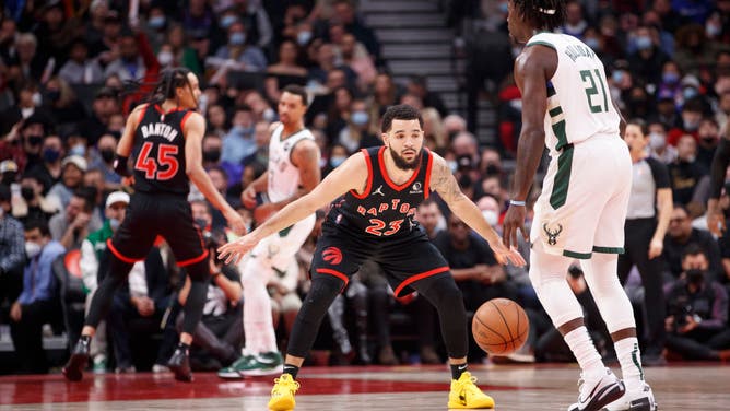 Toronto Raptors PG Fred VanVleet defends against Milwaukee Bucks PG Jrue Holiday at Scotiabank Arena in Toronto, Canada.