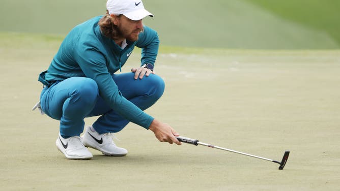 Fleetwood lines up a putt during the 2nd round of The Masters at Augusta National Golf Club.