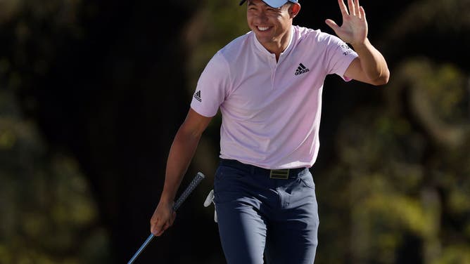 Morikawa after chipping in for birdie from the 18th green-side bunker during Round 4 of the Masters at Augusta National Golf Club in Augusta, Georgia.