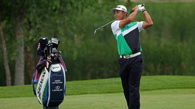 Hideki Matsuyama hits his approach shot on the 10th hole during the pro-am prior to the 3M Open 2022 at TPC Twin Cities in Blaine, Minnesota.