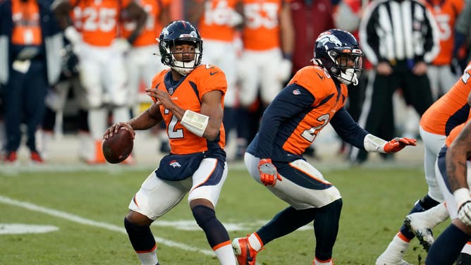 Kendall Hinton of the Denver Broncos drops back to pass during an NFL game against the New Orleans Saints on November 29, 2020 in Denver, Colorado.