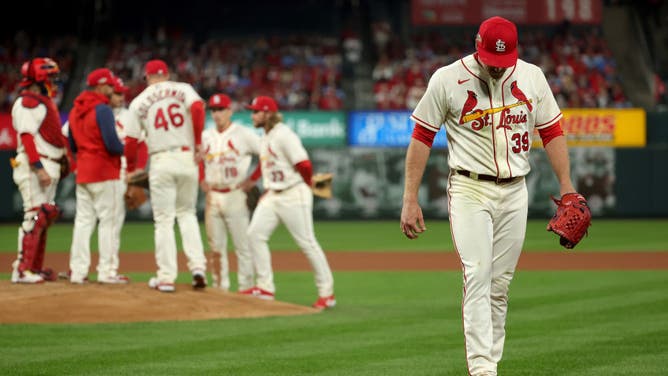 Cardinals' starter Miles Mikolas walks to the dugout after being relieved vs. the Phillies during the 5th inning in Game 2 of the National League Wild Card Series at Busch Stadium in St Louis, Missouri.