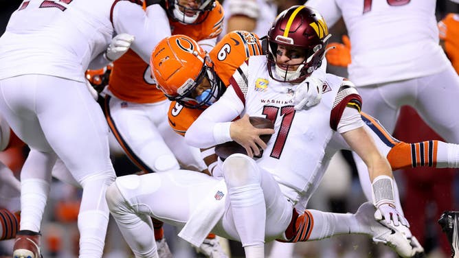 Commanders QB Carson Wentz is sacked on Thursday Night Football by the Bears defense.