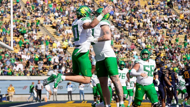 The Oregon Ducks celebrating a touchdown against the California Golden Bears at FTX Field at California Memorial Stadium in Berkeley, California.