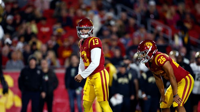 USC Trojans QB Caleb Williams assessing the Colorado Buffaloes' defense at United Airlines Field at the Los Angeles Memorial Coliseum in Los Angeles.