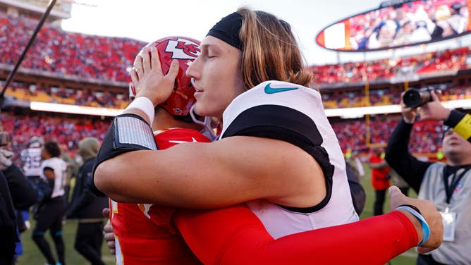 Kansas City Chiefs QB Patrick Mahomes hugs Jacksonville Jaguars QB Trevor Lawrence after the Chiefs beat the Jaguars 27-17 at Arrowhead Stadium in Kansas City, Missouri.