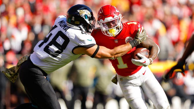 Jaguars LB Chad Muma tackles Chiefs RB Jerick McKinnon at Arrowhead Stadium in Kansas City, Missouri.