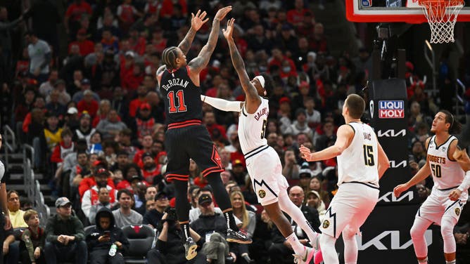 Bulls Wing DeMar DeRozan shoots a fadeaway over the Nuggets at the United Center in Chicago.