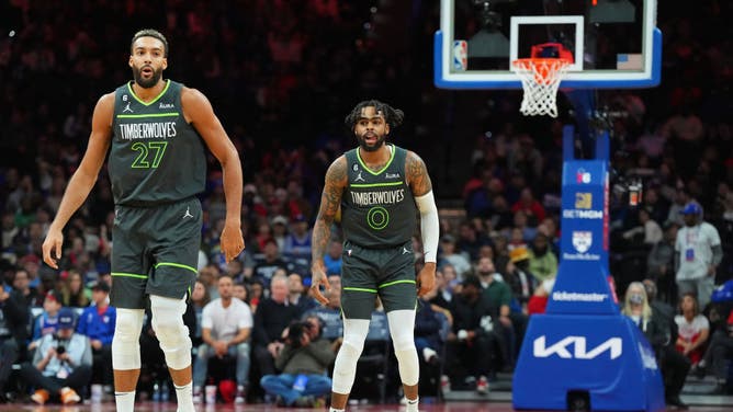 Minnesota Timberwolves C Rudy Gobert and PG D'Angelo Russell in action against the Philadelphia 76ers at the Wells Fargo Center in Philadelphia.