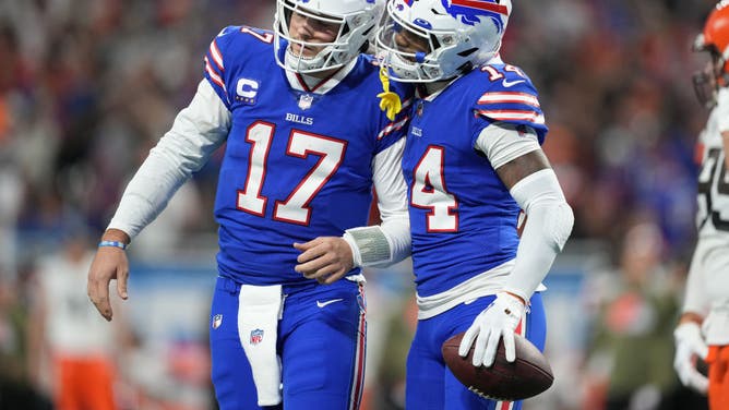 Bills QB Josh Allen embraces with WR Stefon Diggs