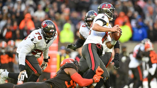 Garrett sacks Buccaneers QB Tom Brady during overtime at FirstEnergy Stadium in Cleveland, Ohio.