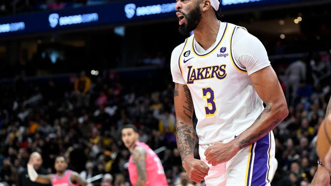 Los Angeles Lakers big Anthony Davis celebrates after dunking the ball against the Washington Wizards at Capital One Arena in Washington, DC.