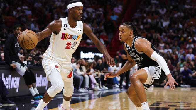 Miami Heat All-Star Jimmy Butler dribbles against San Antonio Spurs SG Romeo Langford during the 3rd quarter of the game at FTX Arena in Miami.