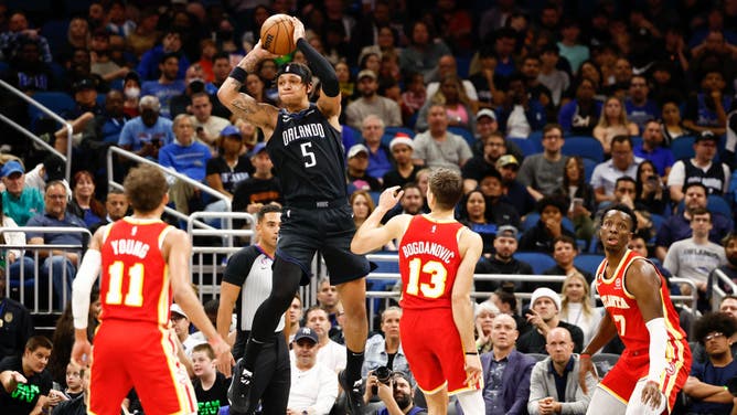 Magic PF Paolo Banchero throws a jump-pass vs. the Atlanta Hawks at Amway Center in Orlando, Florida.