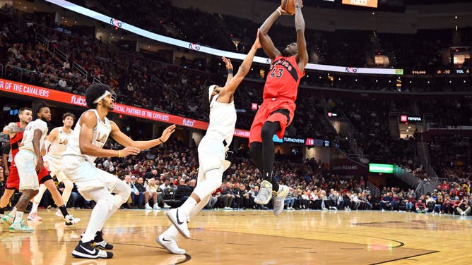 Pascal Siakam shoots over Cavaliers SF Lamar Stevens at Rocket Mortgage Fieldhouse in Cleveland, Ohio.