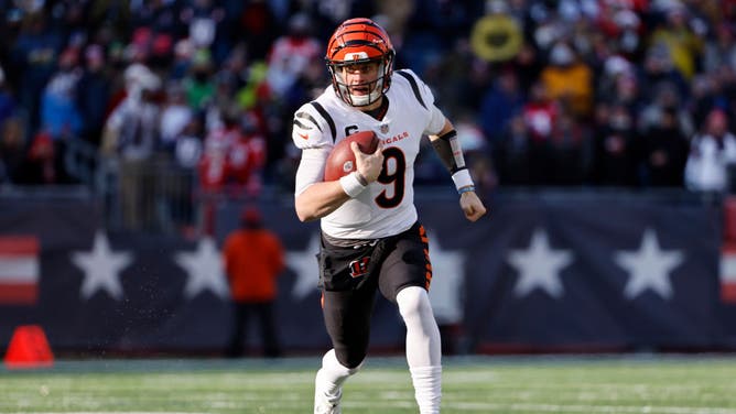 Cincinnati Bengals QB Joe Burrow runs the ball against the New England Patriots at Gillette Stadium in Foxborough, Massachusetts.