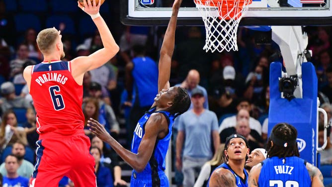 Washington Wizards big Kristaps Porzingis shoots the ball against Orlando Magic big Bol Bol at Amway Center in Orlando, Florida.