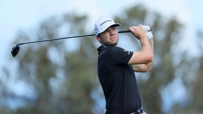 Sam Burns plays his shot from the 4th tee during the first round of the Sentry Tournament of Champions at Plantation Course at Kapalua Golf Club in Lahaina, Hawaii.