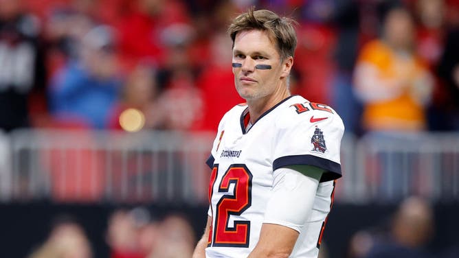 Tampa Bay Buccaneers QB Tom Brady looks on prior to the game against the Atlanta Falcons at Mercedes-Benz Stadium in Atlanta, Georgia.