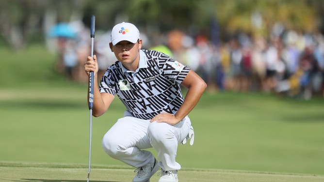 Si Woo Kim lines up a putt on the 18th green during the final round of the Sony Open in Hawaii at Waialae Country Club in Honolulu, Hawaii.