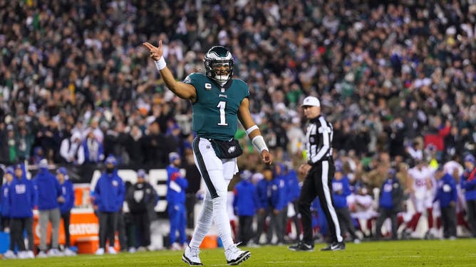 Philadelphia Eagles QB Jalen Hurts gestures for a first down vs. the New York Giants during the NFC Divisional Playoff game at Lincoln Financial Field in Philadelphia.