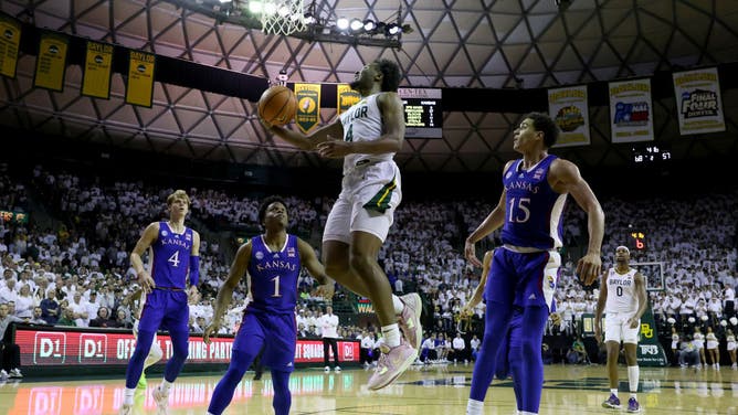 Baylor Bears G LJ Cryer drives to the basket vs. the Kansas Jayhawks at Ferrell Center in Waco, Texas.