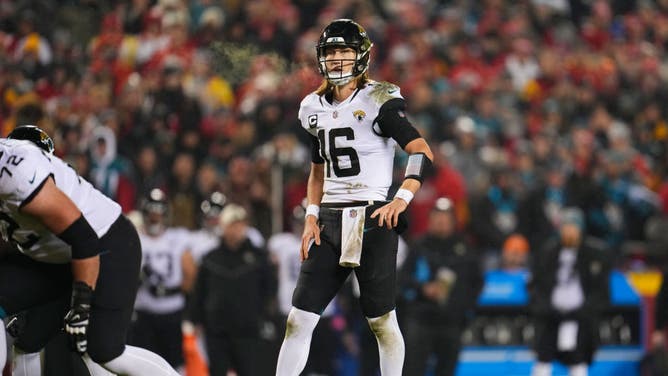 Jaguars QB Trevor Lawrence gets set vs. the Chiefs at GEHA Field at Arrowhead Stadium in Kansas City, Missouri.