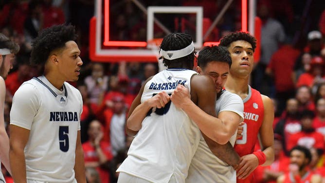 Nevada guards Kenan Blackshear and Jarod Lucas celebrate after a the game-winning basket vs. the New Mexico Lobos at The Pit in Albuquerque, New Mexico.