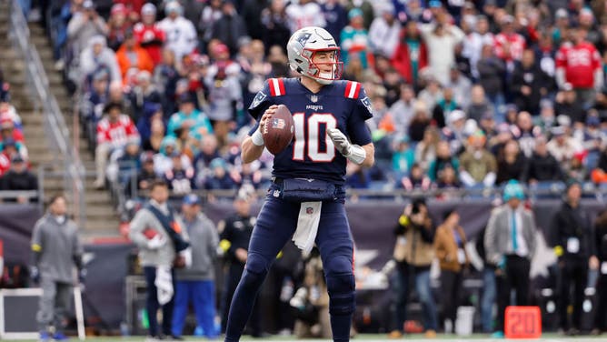 Patriots QB Mac Jones drops back to pass vs. the Miami Dolphins at Gillette Stadium in Foxborough, Massachusetts.