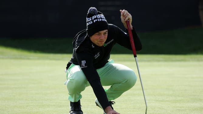 Viktor Hovland lines up a putt on the 17th green during the 1st round of the The Genesis Invitational at Riviera Country Club in Pacific Palisades, California.