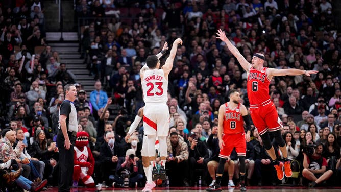 Raptors PG Fred VanVleet shoots over Bulls G Alex Caruso at the Scotiabank Arena in Toronto.