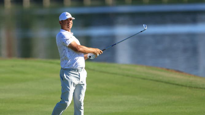 Gary Woodland plays his 2nd shot on the 18th hole during the 3rd round of THE PLAYERS Championship at TPC Sawgrass in Ponte Vedra Beach, Florida.