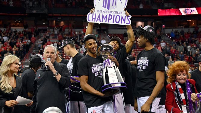 The San Diego State Aztecs celebrate their victory vs. Utah State in the Mountain West Conference championship at the Thomas & Mack Center in Las Vegas.