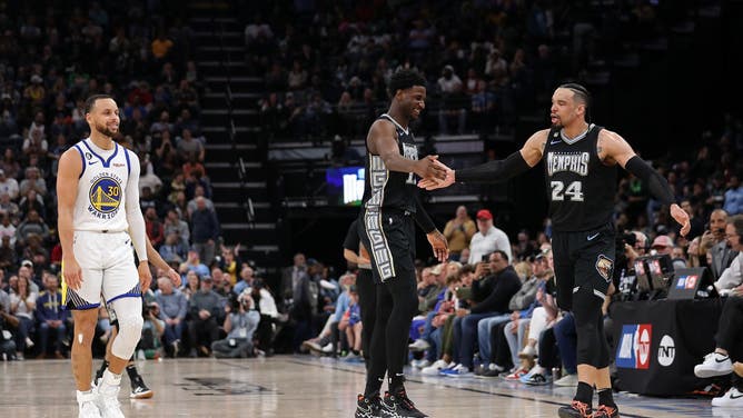 Grizzlies PF Jaren Jackson Jr. and SG Dillon Brooks celebrate at FedExForum in Memphis, Tennessee.