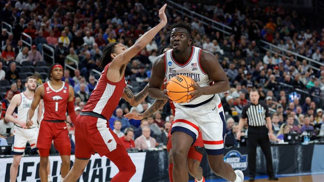 Uconn big Adama Sanogo Huskies against Arkansas G Nick Smith Jr. in the Sweet 16 of the NCAA Tournament 2023 at T-Mobile Arena in Las Vegas.