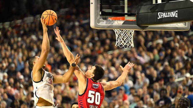 San Diego State F Jaedon LeDee shoots the ball over FAU big Vladislav Goldin in the 2023 Final Four at NRG Stadium.