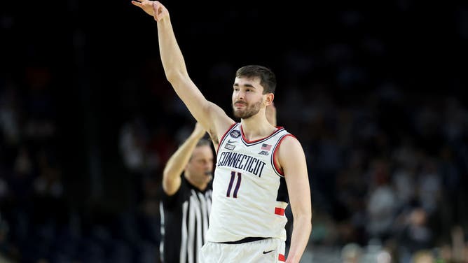Karaban celebrates after making a 3-pointer vs. Miami in the 2023 Final Four at NRG Stadium.