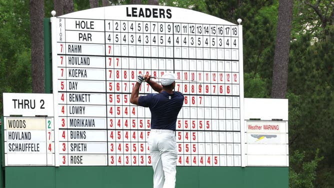 Tiger Woods hitting a shot at the Masters, leaving no divot. This revelation blew the mind of Scottie Scheffler.
