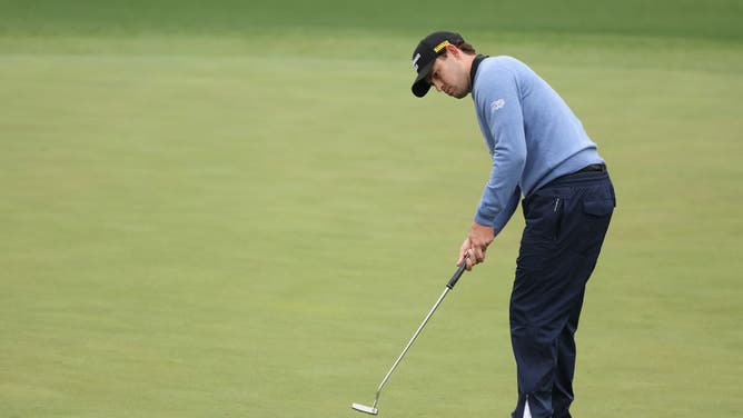 Patrick Cantlay putts on the 8th green during the 3rd round of the 2023 Masters Tournament at Augusta National Golf Club in Georgia.