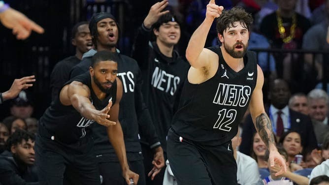 Nets' Joe Harris and Mikal Bridges react vs. the 76ers during Game 1 of the Eastern Conference 1st-Round Playoffs at the Wells Fargo Center in Philadelphia.